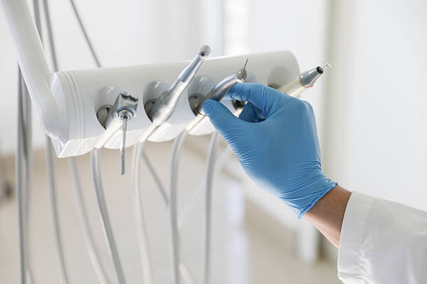 Professional Tooth Extraction technician working in Las Campanas, NM